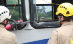 Students Practice Fire Techniques On Donated Bus